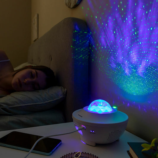 Projecteur étoiles LED blanc avec haut-parleur Bluetooth et télécommande